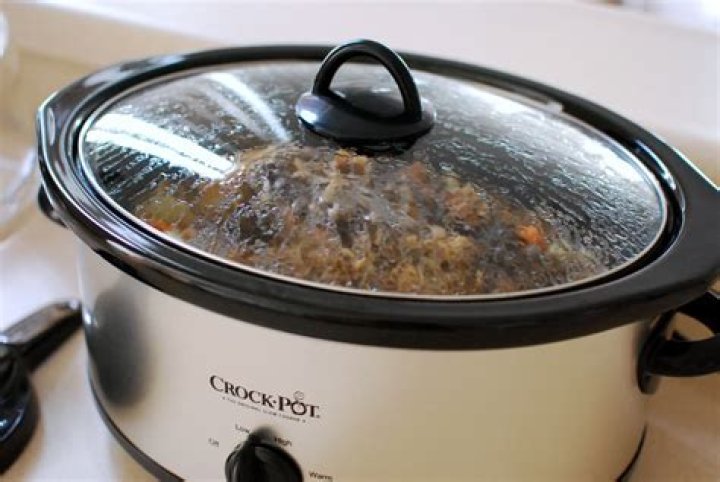 What does the auto setting on a crock pot mean